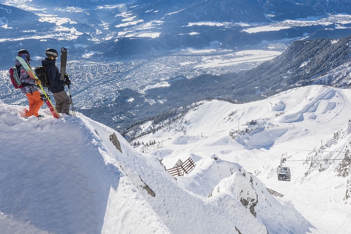 Skiers overlooking Innsbruck